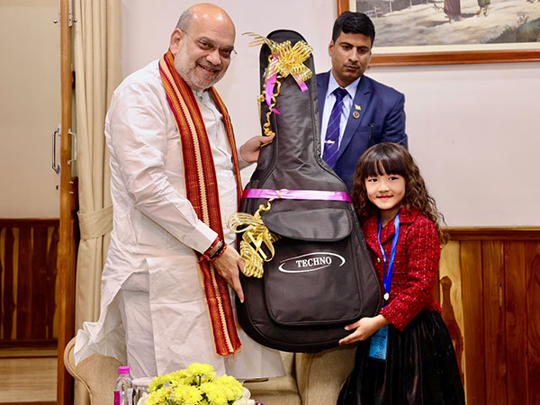 Amit Shah Gifts Guitar to Mizoram's